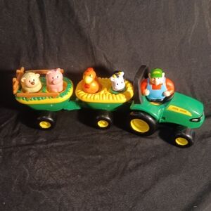 Toy john deer tractor with animals